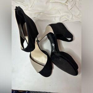 Nive West womantwo tone, black&cream leather and suede 8 1/2 like peeling inside